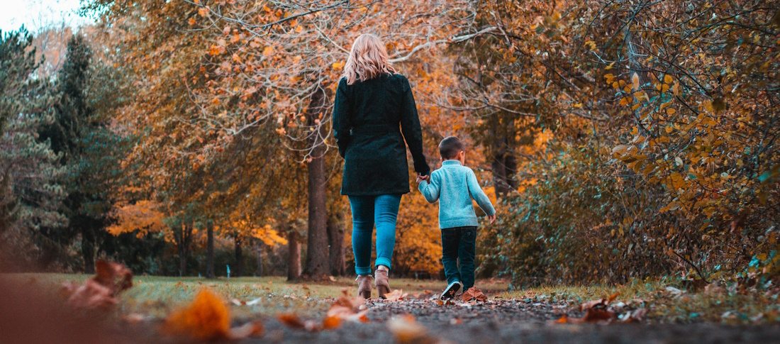 A mother and daughter go for a walk in a Columbus park