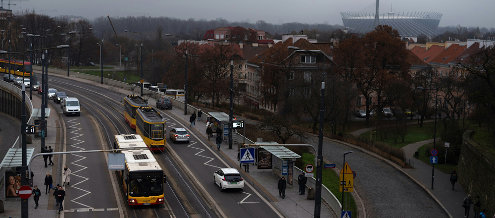 Tram and Bus in Warsaw by Vitali Adutskevich on Unsplash