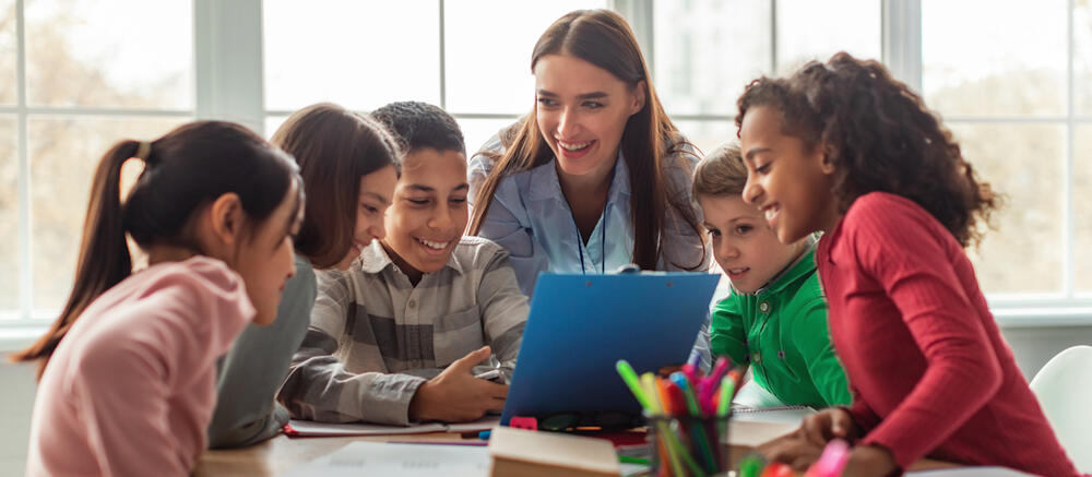 teacher with diverse group of students