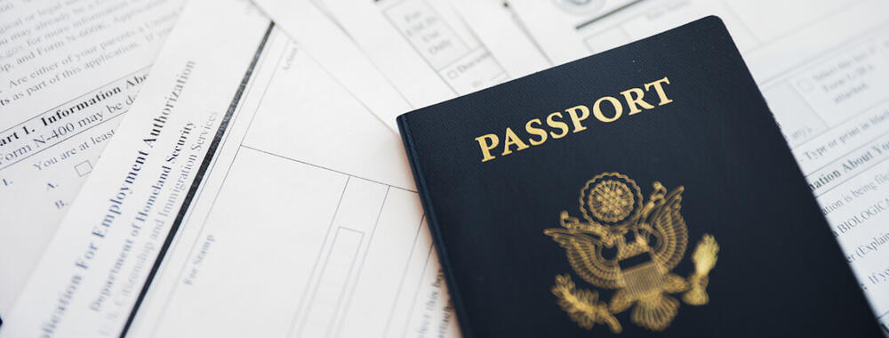 passport with work permit paperwork