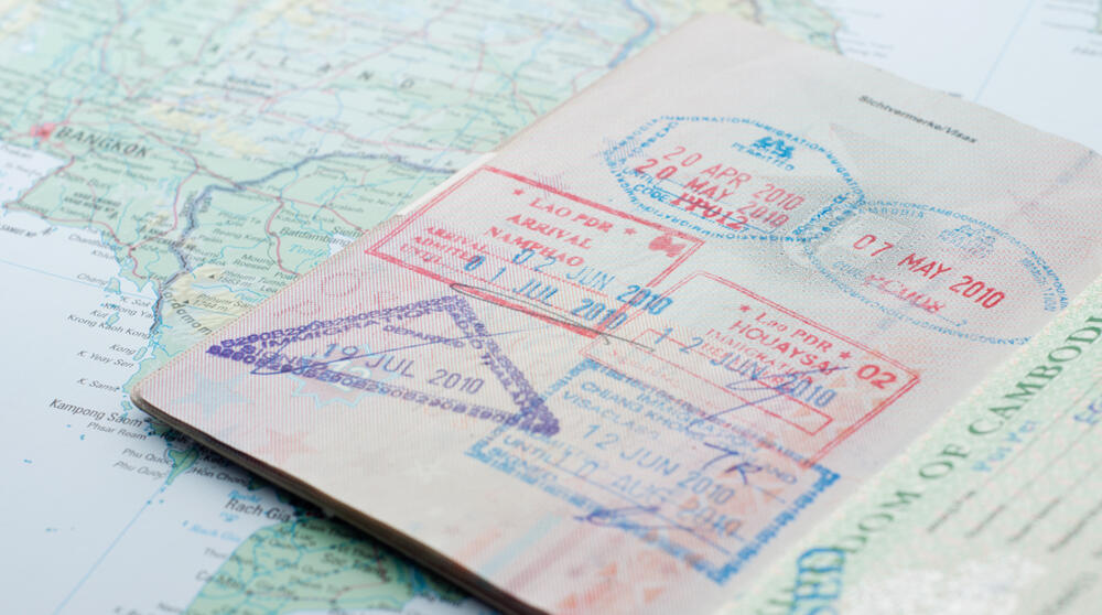 passport with stamps and map