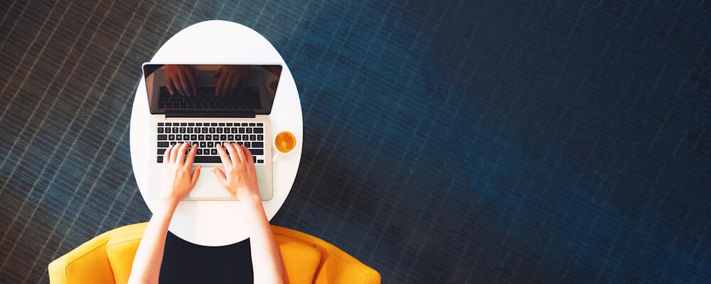 Person job hunting on a laptop